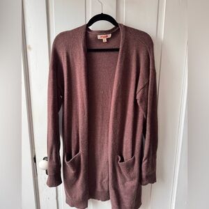 Chocolate brown cardigan with front pockets. Size L